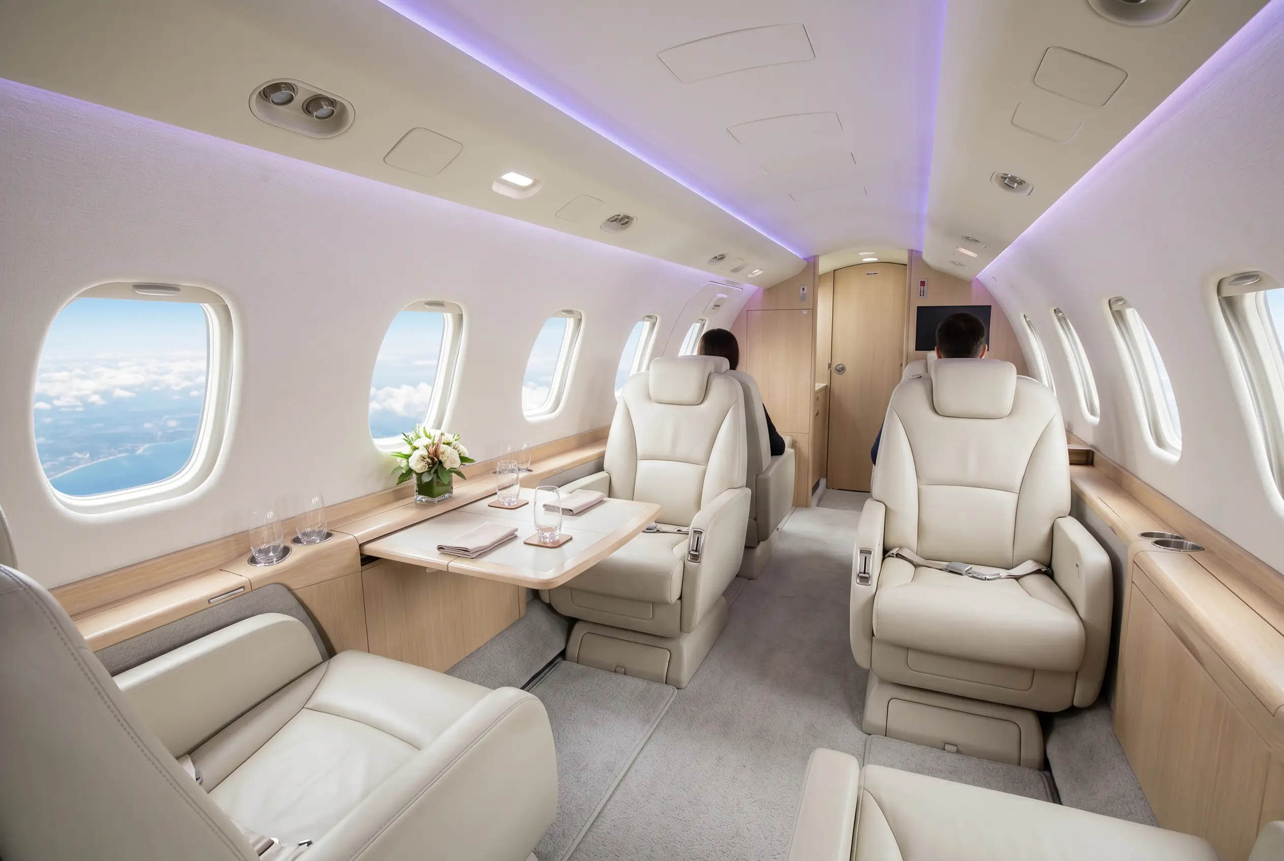 Cessna Citation Excel stand-up cabin with club seating for a Miami to New York charter