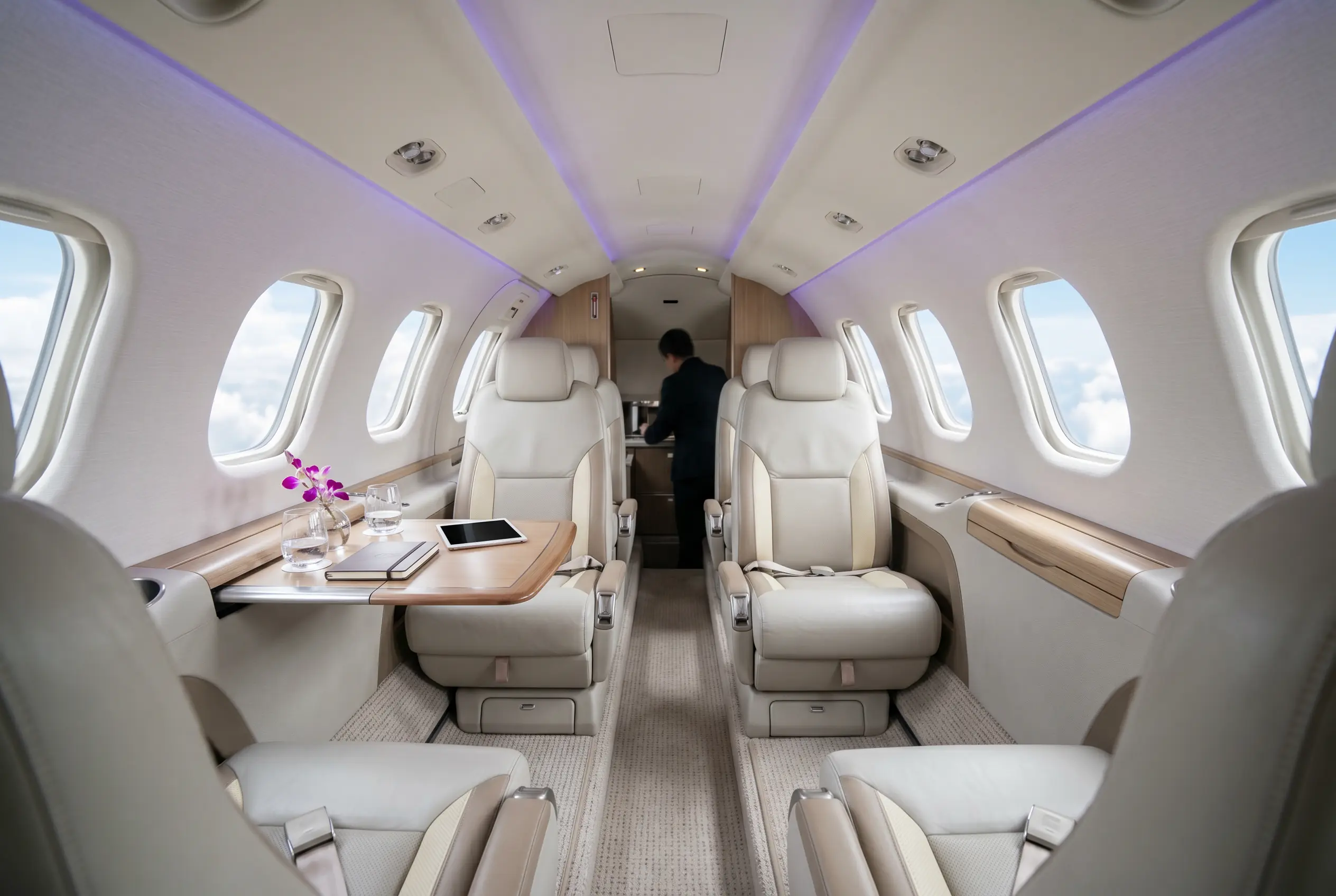 Cessna Citation Mustang cabin with club seating set for a Miami to New York charter