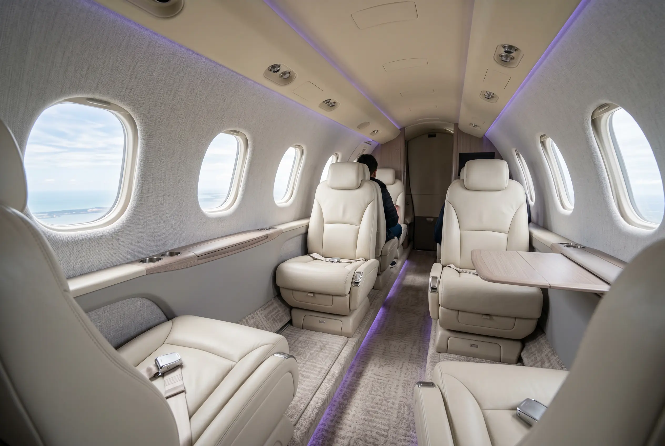 Cessna Citation X cabin with club seating for a Miami to New York charter