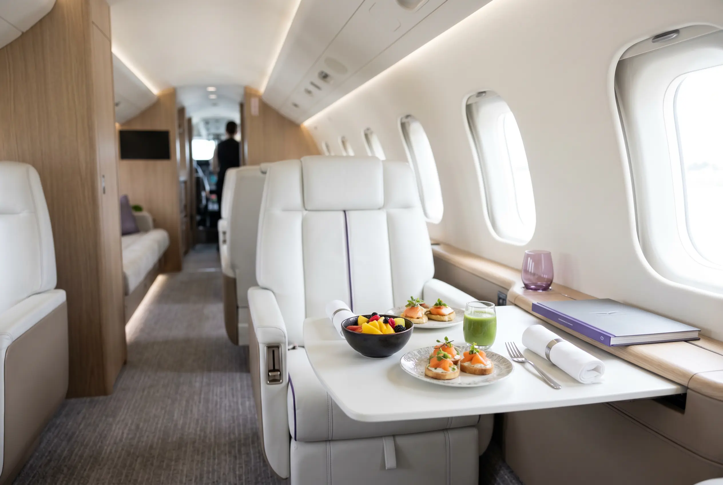 Fine in-flight catering laid out in a jet cabin for a Miami to New York charter