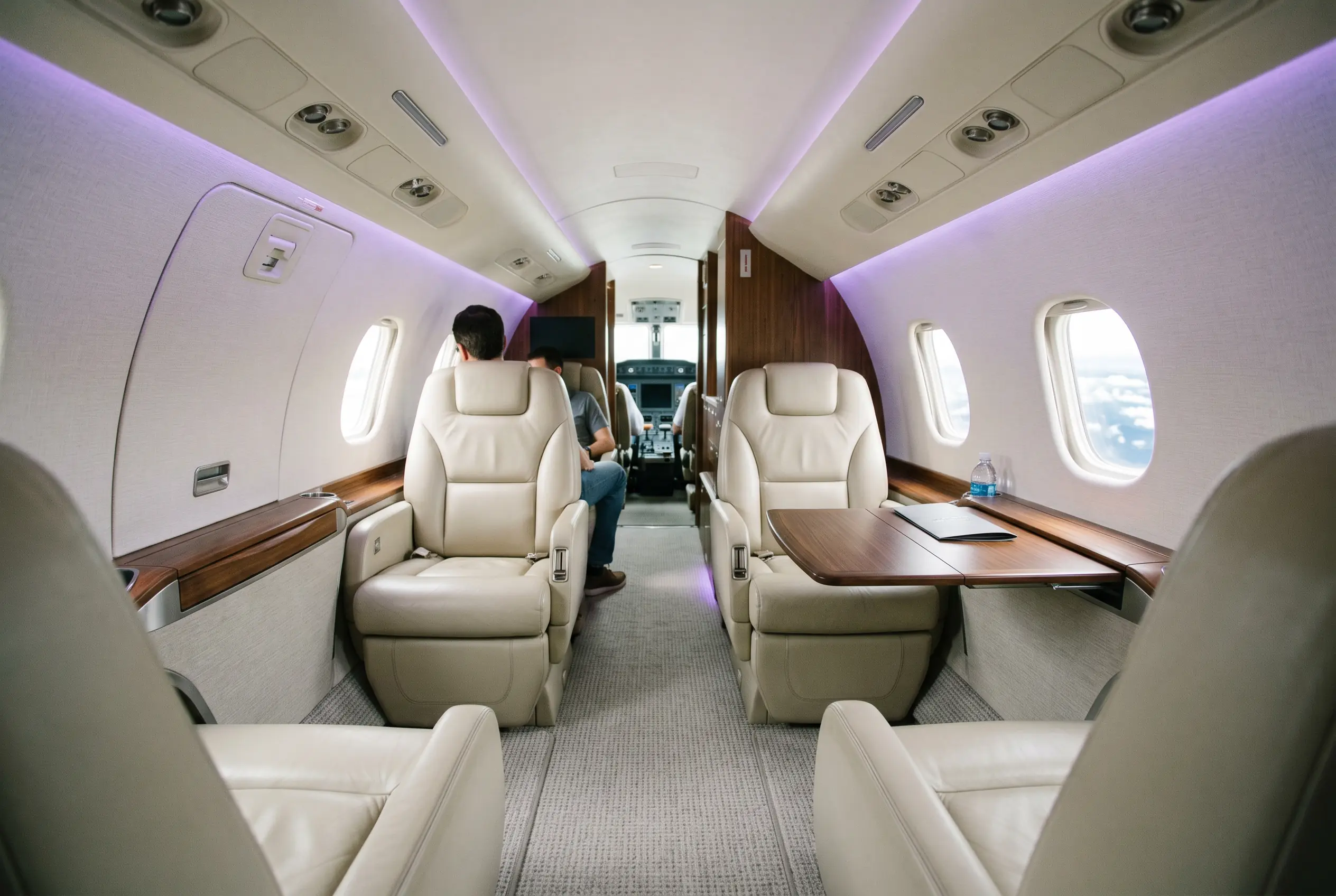 Gulfstream G150 cabin with club seating for a Miami to New York charter