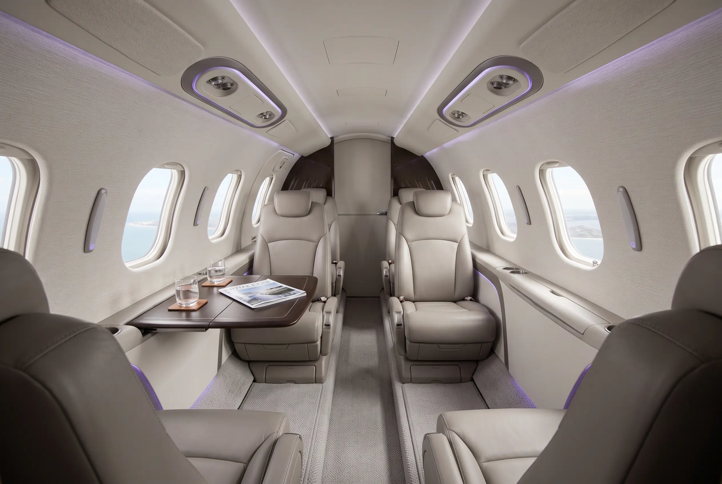 HondaJet Elite II cabin with club seating set for a Miami to New York charter