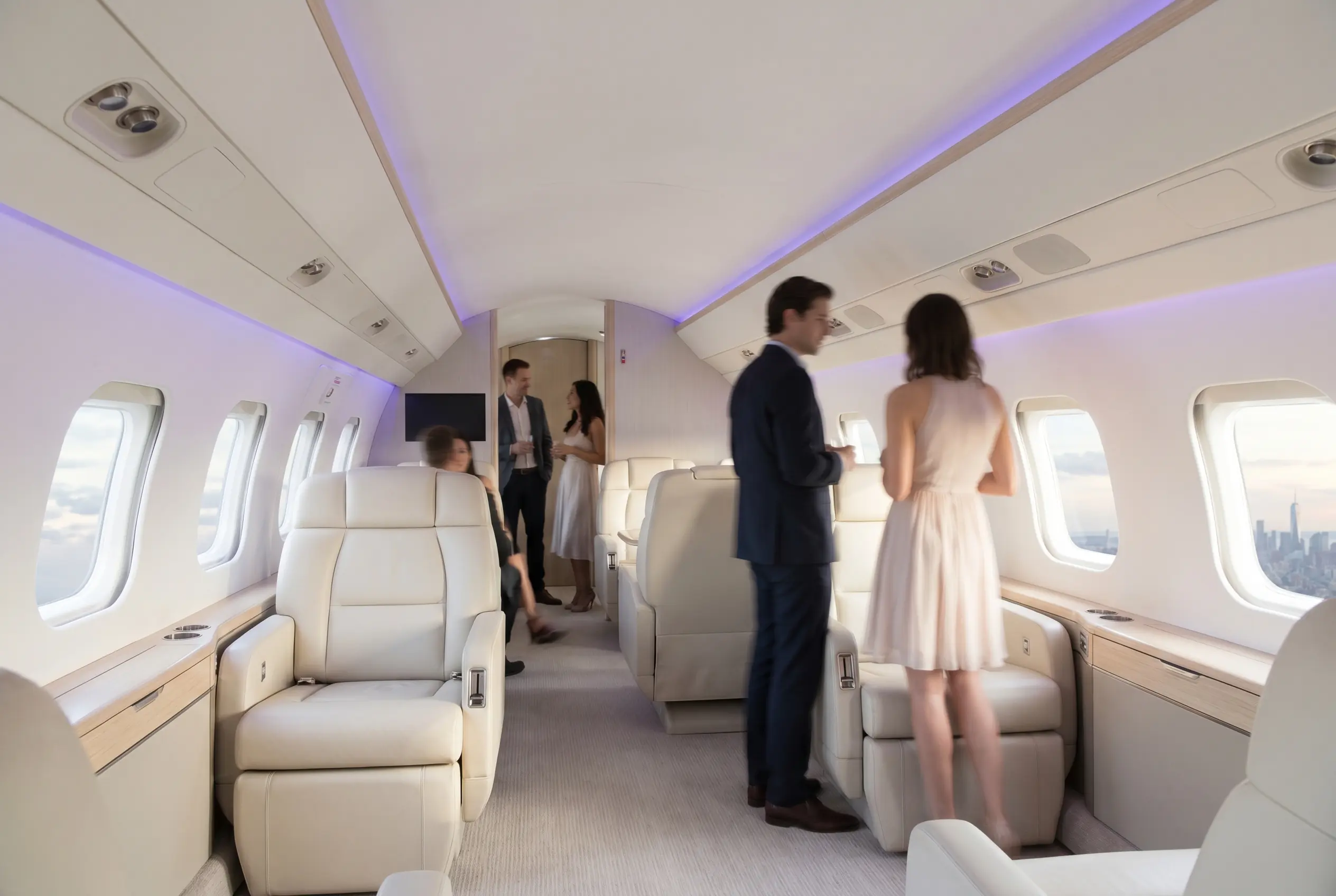 Guests in evening dress aboard a jet cabin for a Miami to New York event charter