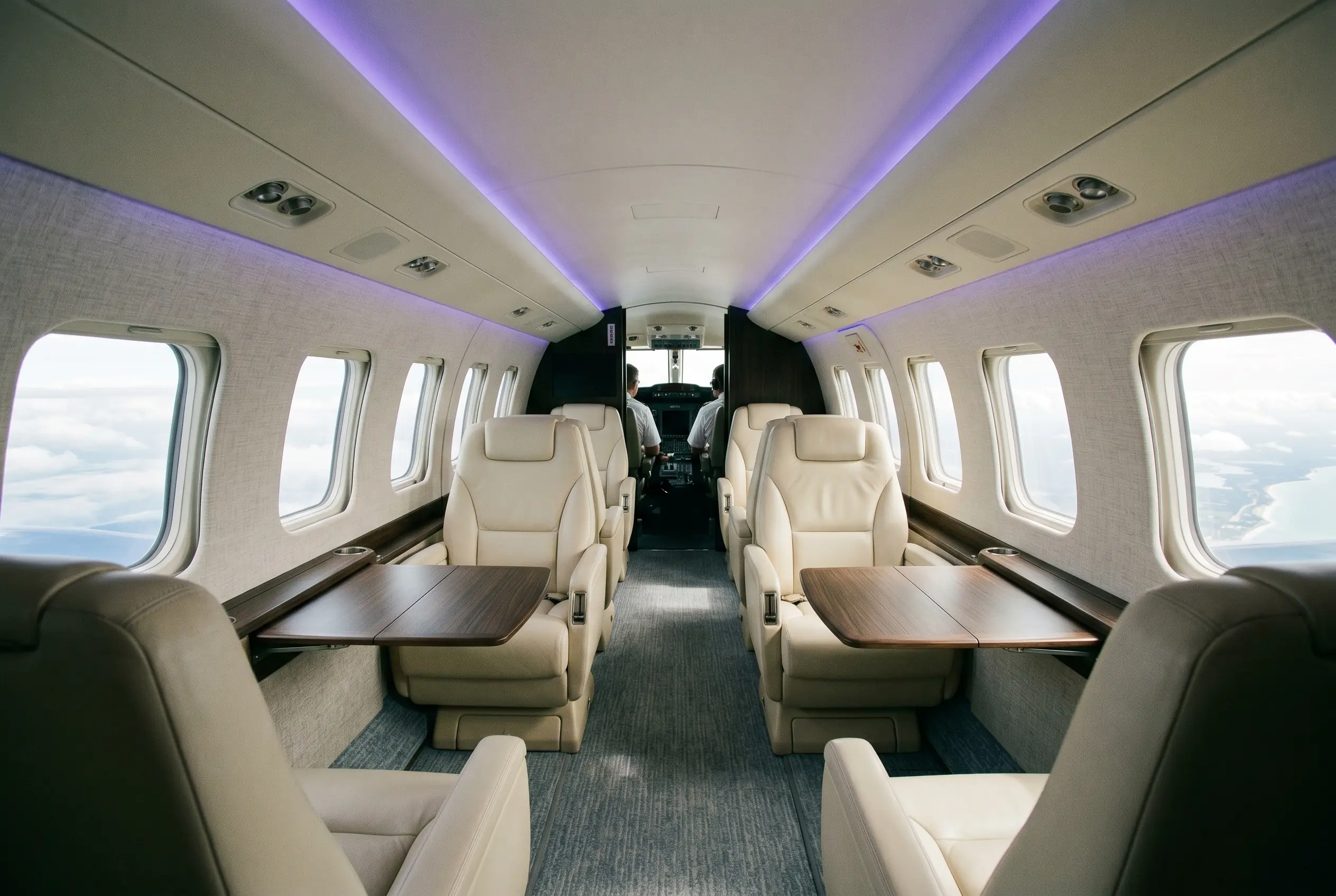 Beechcraft King Air 350 cabin in double-club layout for a Miami to New York charter