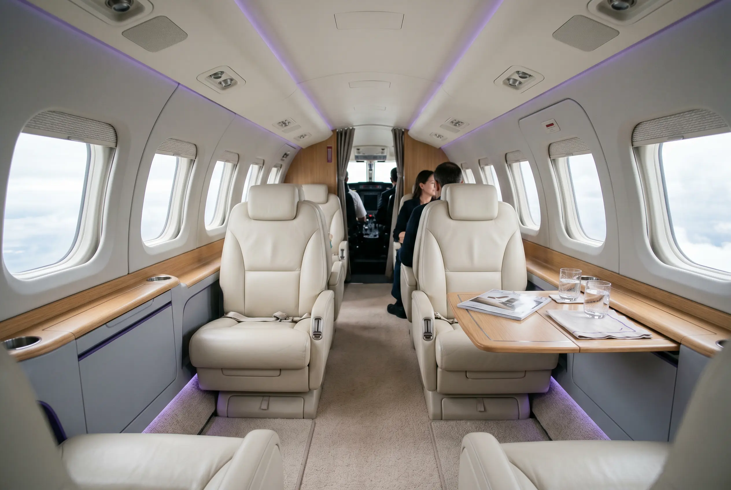 King Air C90GTx cabin with club seating set for a Miami to New York charter