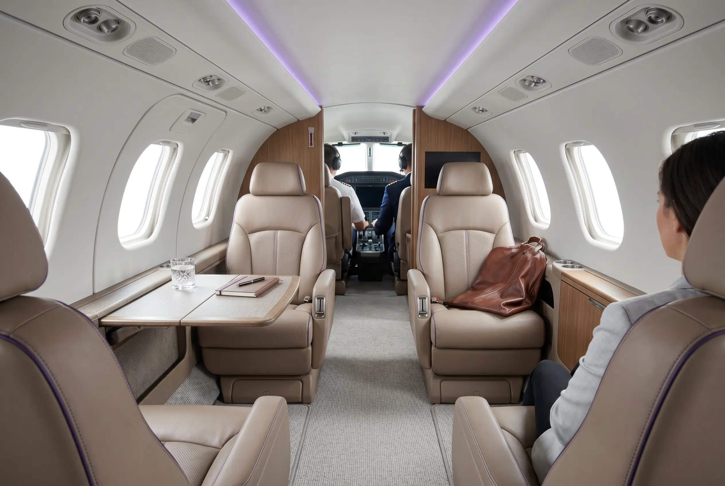 Daher TBM 960 cabin with leather seating set for a Miami to New York charter