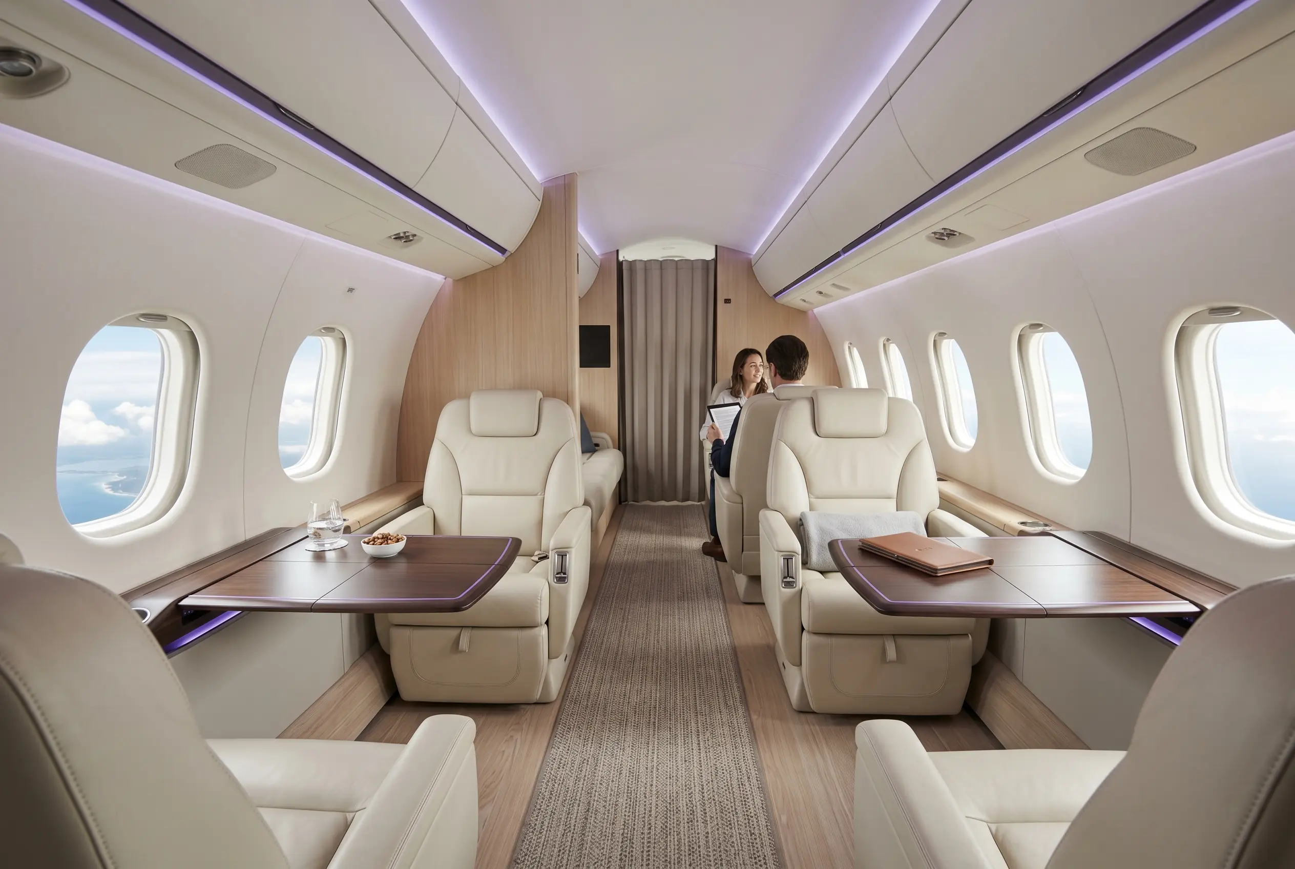 Pressurised turboprop cabin with club seating laid out for a Miami to New York flight